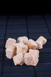 brown sugar on dark background