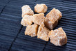 brown sugar on dark background