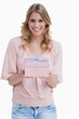 Smiling young woman holding a present