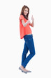 Side view of a teenager showing her two thumbs up