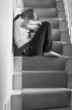 Upset girl on stairs