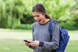 Photo: Young girl showing her surprise after receiving a text Young girl showing her surprise after receiving a text