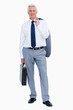 Portrait of a cool businessman with a suitcase