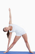 Smiling woman practicing yoga Smiling woman practicing yoga