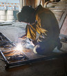Welder with protective mask welding metal Welder with protective mask welding metal