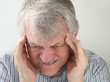 man with terrible headache