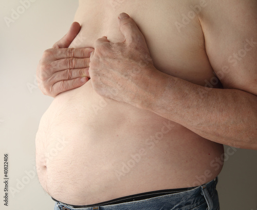 Photo: heavy man with pain in chest heavy man with pain in chest