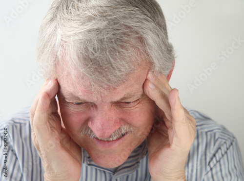 Photo: man with terrible headache man with terrible headache