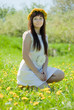Smiling girl sitting outdoor Smiling girl sitting outdoor