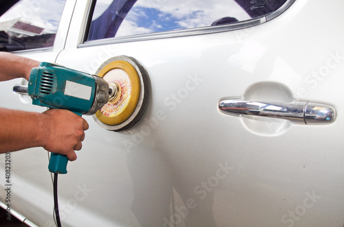 Photo: power buffer machine at service station - a series of CAR CARE power buffer machine at service station - a series of CAR CARE