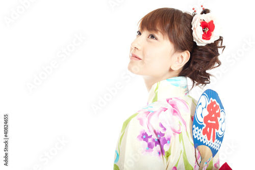 Foto: Beautiful kimono woman. Portrait of asian woman. Beautiful kimono woman. Portrait of asian woman.