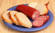 sausage bread, onions on a plate sausage bread, onions on a plate