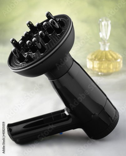 Photo: Black Hair Dryer with perfume in a glass bottle Black Hair Dryer with perfume in a glass bottle