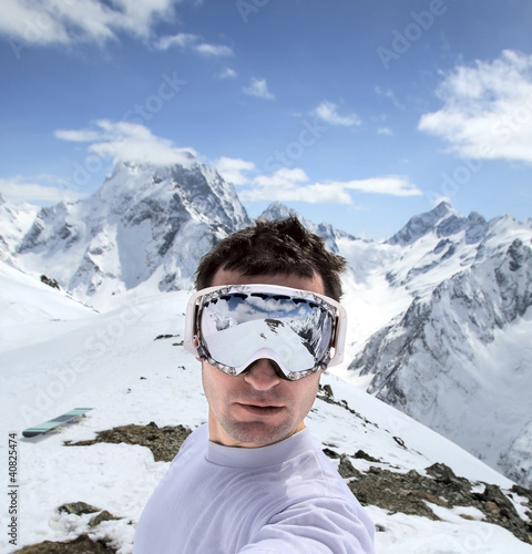 Photo: Snowboarder in mountains of the Caucasus Snowboarder in mountains of the Caucasus