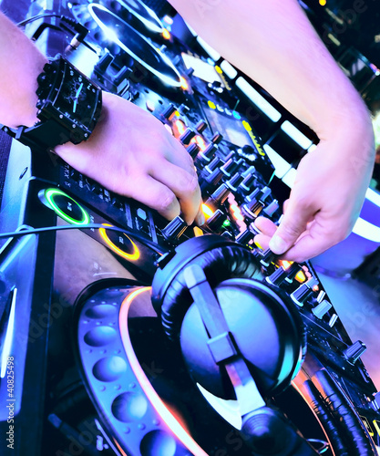 Photo: Dj mixes the track Dj mixes the track
