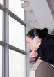 Foto: Downsizing, sad business woman Sitting on Stairs Downsizing, sad business woman Sitting on Stairs