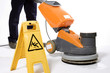 cleaning floor with machine