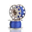 Metal spools of thread isolated on white