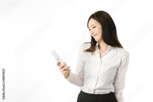 Photo: 携帯電話と女性 携帯電話と女性