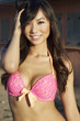 Pretty smiling Asian bikini model