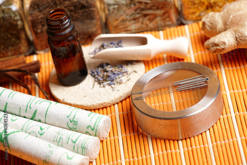 Photo: Acupuncture needles, moxa sticks and lavender petals Acupuncture needles, moxa sticks and lavender petals