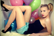 Young attractive woman and baloons