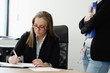 Workers waiting for approval signature Workers waiting for approval signature
