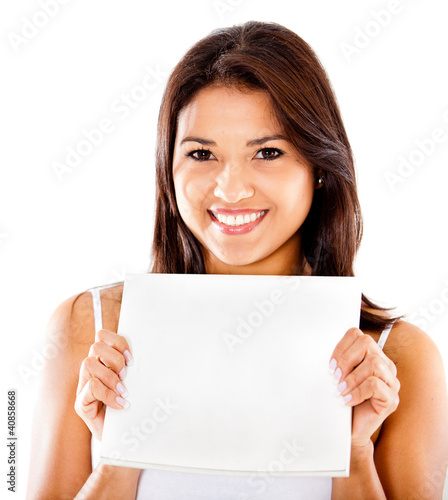 Photo: Woman holding a document Woman holding a document