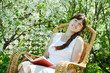Relaxing  girl in bloom garden
