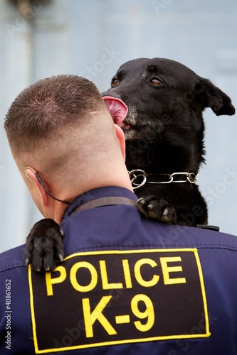 Photo: A kiss from his K9 A kiss from his K9