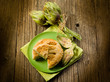vegetarian quiche with artichoke on wood background vegetarian quiche with artichoke on wood background