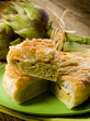 vegetarian quiche with artichoke on wood background vegetarian quiche with artichoke on wood background