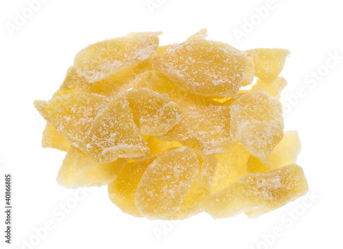 Photo: Crystallized ginger slices on white background Crystallized ginger slices on white background