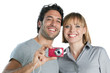 Smiling couple taking photos