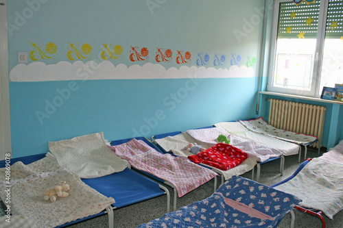 Photo: dormitory for children with small beds for a kindergarten dormitory for children with small beds for a kindergarten