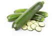 Foto: Zucchini or courgette sliced on white, clipping path i Zucchini or courgette sliced on white, clipping path i