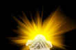 Spiritual light in cupped hands