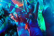 Foto: Party people dancing in disco or club Party people dancing in disco or club