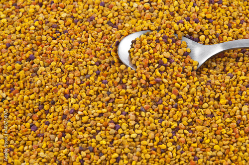 Photo: Pollen grains with a table spoon Pollen grains with a table spoon
