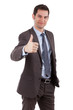 Young caucasian businessman making thumbs up gesture