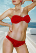 woman in red underwear on yacht