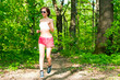 young woman running in park young woman running in park