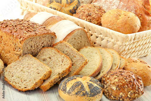 Photo: Composition with bread and rolls on the table Composition with bread and rolls on the table