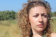 Beautiful curly hair woman outside