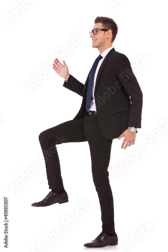 Photo: business man stepping up business man stepping up