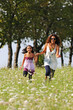 mother and daughter running