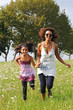 mother and daughter running