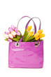 Bag and flowers isolated on the white background
