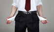 The businessman shows his empty pockets