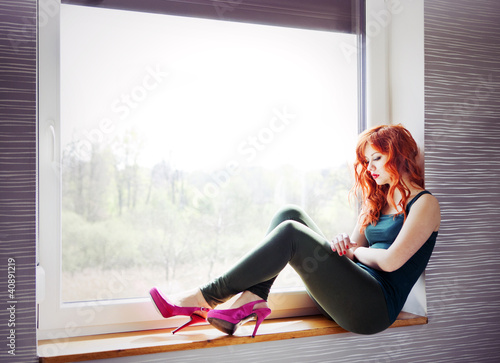 Photo: Young lonely woman Young lonely woman